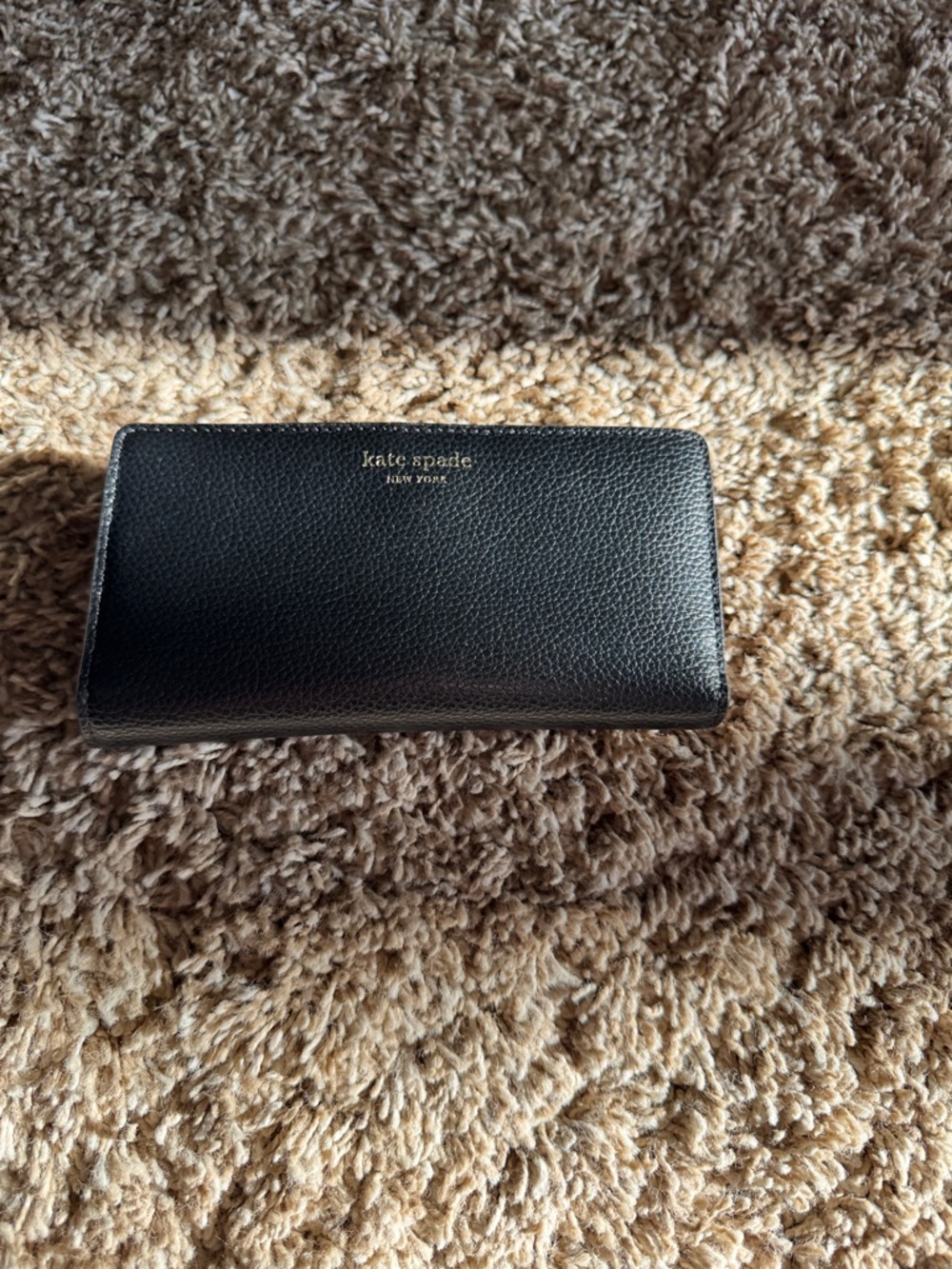 kate spade Black Pebbled Leather Zip-Around Wallet with Gold Logo